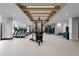 Modern gym featuring treadmills, weights, and workout machines for residents at 2425 Peachtree Ne Rd # 1503, Atlanta, GA 30305