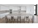Gourmet kitchen with sleek white cabinetry, premium appliances, and a spacious center island with barstool seating at 2425 Peachtree Ne Rd # 1503, Atlanta, GA 30305