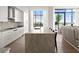 Modern kitchen featuring a large island, custom cabinets, and high-end appliances for culinary enthusiasts at 2425 Peachtree Ne Rd # 1503, Atlanta, GA 30305