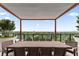 Outdoor dining area with seating for eight, covered pergola and sweeping city views at 2425 Peachtree Ne Rd # 1503, Atlanta, GA 30305
