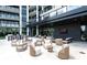 Outdoor patio area featuring modern furniture, fire pit, barbeque area, and outdoor television at 2425 Peachtree Ne Rd # 1503, Atlanta, GA 30305