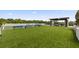 Rooftop terrace featuring modern grills, turf, and an outdoor game court at 2425 Peachtree Ne Rd # 1503, Atlanta, GA 30305