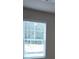 Bedroom with natural light streaming through the blinds at 2812 Lillian Ln, Douglasville, GA 30135