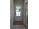 View of white front door with glass and side door at 2812 Lillian Ln, Douglasville, GA 30135