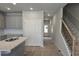 Spacious kitchen area with gray cabinets and stainless sink at 2812 Lillian Ln, Douglasville, GA 30135