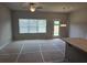Open-concept living area with a large window and a glass door at 2812 Lillian Ln, Douglasville, GA 30135