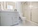 Updated bathroom featuring a modern vanity with sleek hardware and a glass-enclosed shower at 3312 Northcrest Rd # A, Atlanta, GA 30340
