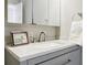 The bathroom sink with quartz counter and chrome faucet is the focal point of this room at 3312 Northcrest Rd # A, Atlanta, GA 30340