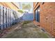 Private back patio features sliding glass doors, brick accents, with ample space for outdoor seating and relaxation at 3318 Northcrest Rd # D, Atlanta, GA 30340