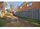 Private fenced-in backyard offering a tranquil retreat with lush greenery, ideal for outdoor relaxation at 3318 Northcrest Rd # D, Atlanta, GA 30340