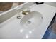 Close up of a bathroom sink with gold faucet and ornate crystal handles at 3318 Northcrest Rd # D, Atlanta, GA 30340
