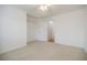 Bedroom featuring closet, white walls, carpet floor, and bright window at 3318 Northcrest Rd # D, Atlanta, GA 30340