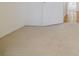 Bright bedroom with carpeted floor and white door at 3318 Northcrest Rd # D, Atlanta, GA 30340