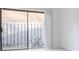 Bright room with sliding glass door and small patio area at 3318 Northcrest Rd # D, Atlanta, GA 30340