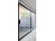 Sliding glass door leading to a patio area with outdoor seating at 3318 Northcrest Rd # D, Atlanta, GA 30340
