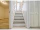 Stairway with door and closet in the hallway at 3318 Northcrest Rd # D, Atlanta, GA 30340