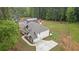 Stunning aerial view of home featuring an outbuilding, new driveway, and lush green landscaping at 337 Paynes Lake Rd, Carrollton, GA 30116