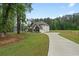 Spacious home with long private driveway and surrounding wooded area at 337 Paynes Lake Rd, Carrollton, GA 30116