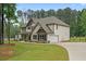 Charming two-story home with a beautifully landscaped yard, garage and private driveway at 337 Paynes Lake Rd, Carrollton, GA 30116