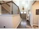 Bright foyer with tall ceilings and wood-look floors next to the stairway at 337 Paynes Lake Rd, Carrollton, GA 30116