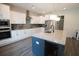Modern kitchen with granite countertops, stainless steel appliances, and a stylish island at 337 Paynes Lake Rd, Carrollton, GA 30116
