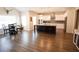 Open kitchen featuring an island, pendant lighting, and dining area for modern living at 337 Paynes Lake Rd, Carrollton, GA 30116