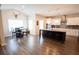 Spacious kitchen with large island, modern light fixtures, and stainless steel appliances at 337 Paynes Lake Rd, Carrollton, GA 30116