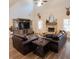 Living room featuring vaulted ceilings, a brick fireplace, and hardwood floors at 337 Paynes Lake Rd, Carrollton, GA 30116