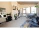Enjoy the outdoors in this screened-in porch with a mini fridge, TV, and comfortable seating for entertainment at 337 Paynes Lake Rd, Carrollton, GA 30116