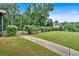 Beautiful landscaped backyard leading to home at 17 River Walk Pkwy, Euharlee, GA 30145