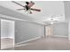 Spacious basement with a finished floor, ceiling fans, and white trim at 17 River Walk Pkwy, Euharlee, GA 30145