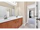 Bathroom with double sinks and a connecting door to the bedroom at 17 River Walk Pkwy, Euharlee, GA 30145