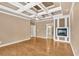 Open primary bedroom featuring trey ceilings, hardwood flooring, recessed lights, and a gas fireplace at 17 River Walk Pkwy, Euharlee, GA 30145