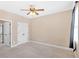 Bedroom with neutral-colored walls, carpet, and two doors at 17 River Walk Pkwy, Euharlee, GA 30145