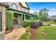 Inviting front porch with stone walkway, lush landscaping, and charming architectural details at 17 River Walk Pkwy, Euharlee, GA 30145
