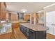 Gourmet kitchen with granite countertops, custom cabinets, and a large center island at 17 River Walk Pkwy, Euharlee, GA 30145