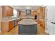 View of the kitchen with stainless steel appliances, tile backsplash and eat in bar at 17 River Walk Pkwy, Euharlee, GA 30145