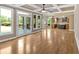 Open concept living room leading into the kitchen with windows to the deck at 17 River Walk Pkwy, Euharlee, GA 30145