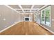 Large living room area with trey ceilings, recessed lighting and a stone fireplace at 17 River Walk Pkwy, Euharlee, GA 30145