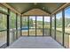 Relaxing screened porch with view of the pool and backyard at 17 River Walk Pkwy, Euharlee, GA 30145