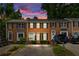 Charming brick townhomes with well-maintained landscaping and individual driveways at 2779 Bentley Se Pl, Marietta, GA 30067