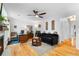 Comfortable living room featuring hardwood floors, desk, and contemporary furnishings at 2779 Bentley Se Pl, Marietta, GA 30067