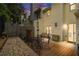 Outdoor patio area with a table, chairs, and a wooden deck, perfect for entertaining or relaxing at 2779 Bentley Se Pl, Marietta, GA 30067