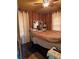 Bedroom featuring a comfortable bed and vintage decor at 2800 Browntown Nw Rd, Atlanta, GA 30318