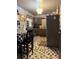 Efficient kitchen with stainless steel appliances and tiled floor at 2800 Browntown Nw Rd, Atlanta, GA 30318