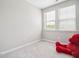 Bright bedroom with neutral carpet and two windows for plenty of light at 3313 Park Pointe Cir, Scottdale, GA 30079
