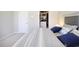 Bedroom with a well-organized walk-in closet offering ample storage space at 3313 Park Pointe Cir, Scottdale, GA 30079