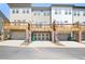 Townhome exteriors with garages and private decks offering outdoor living at 3313 Park Pointe Cir, Scottdale, GA 30079