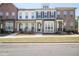 Charming townhome with varied facades, inviting entrances, and well-manicured front lawns at 3313 Park Pointe Cir, Scottdale, GA 30079