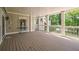 Large back deck provides ample space for entertaining and enjoying the wooded and lake views at 7815 Bamby Rd, Cumming, GA 30041